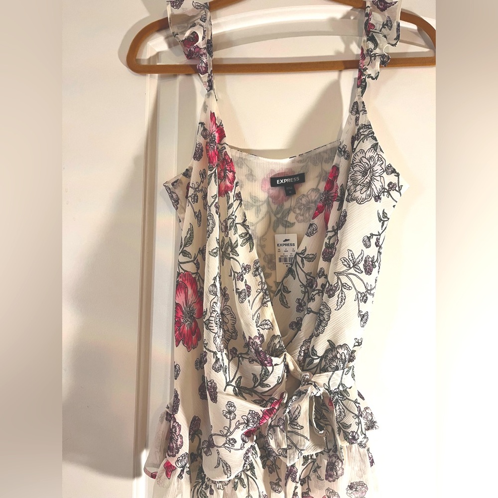 Express wrap around tie flowered sleeveless blouse